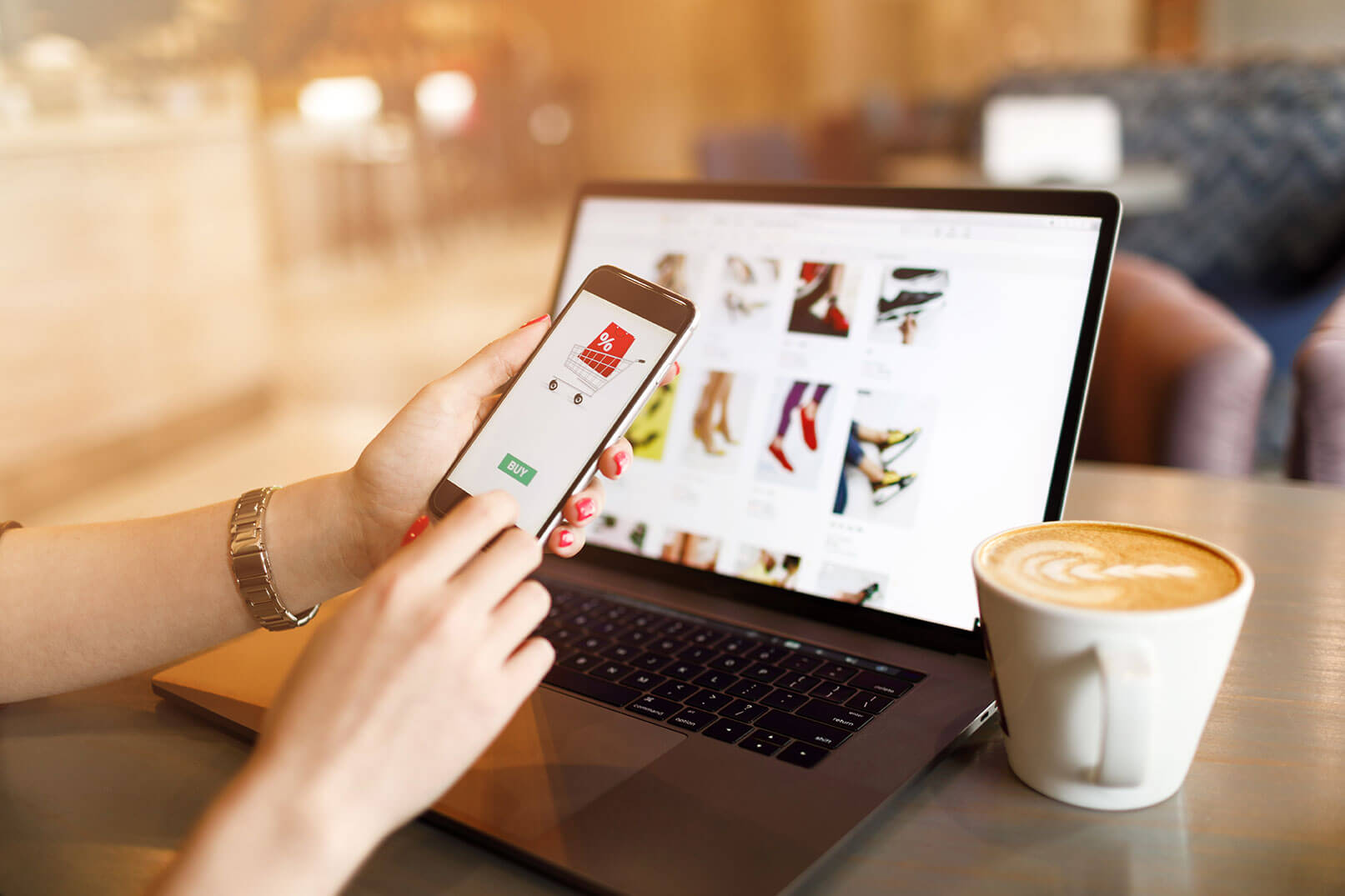 A woman wearing a white shirt holds a smartphone and scrolls through pictures of clothing for sale.